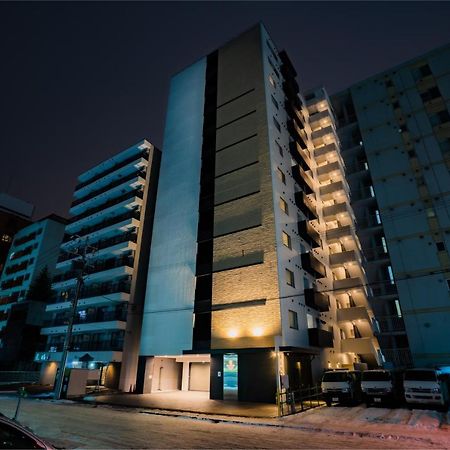 Randor Hotel Sapporo Suites Buitenkant foto Residential complex in the city