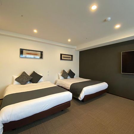 Randor Hotel Sapporo Suites Buitenkant foto A room at the hotel