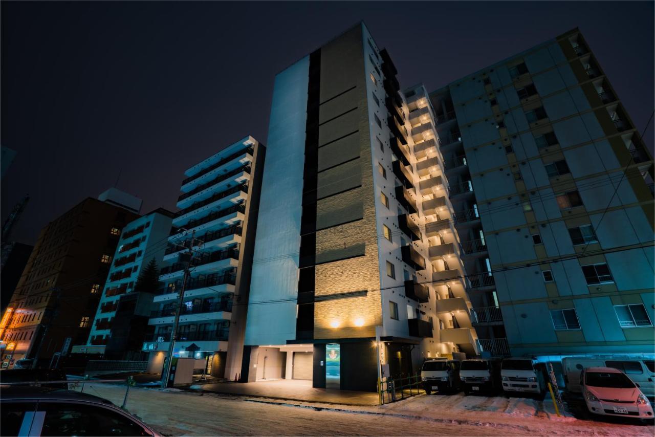 Randor Hotel Sapporo Suites Buitenkant foto Residential complex in the city
