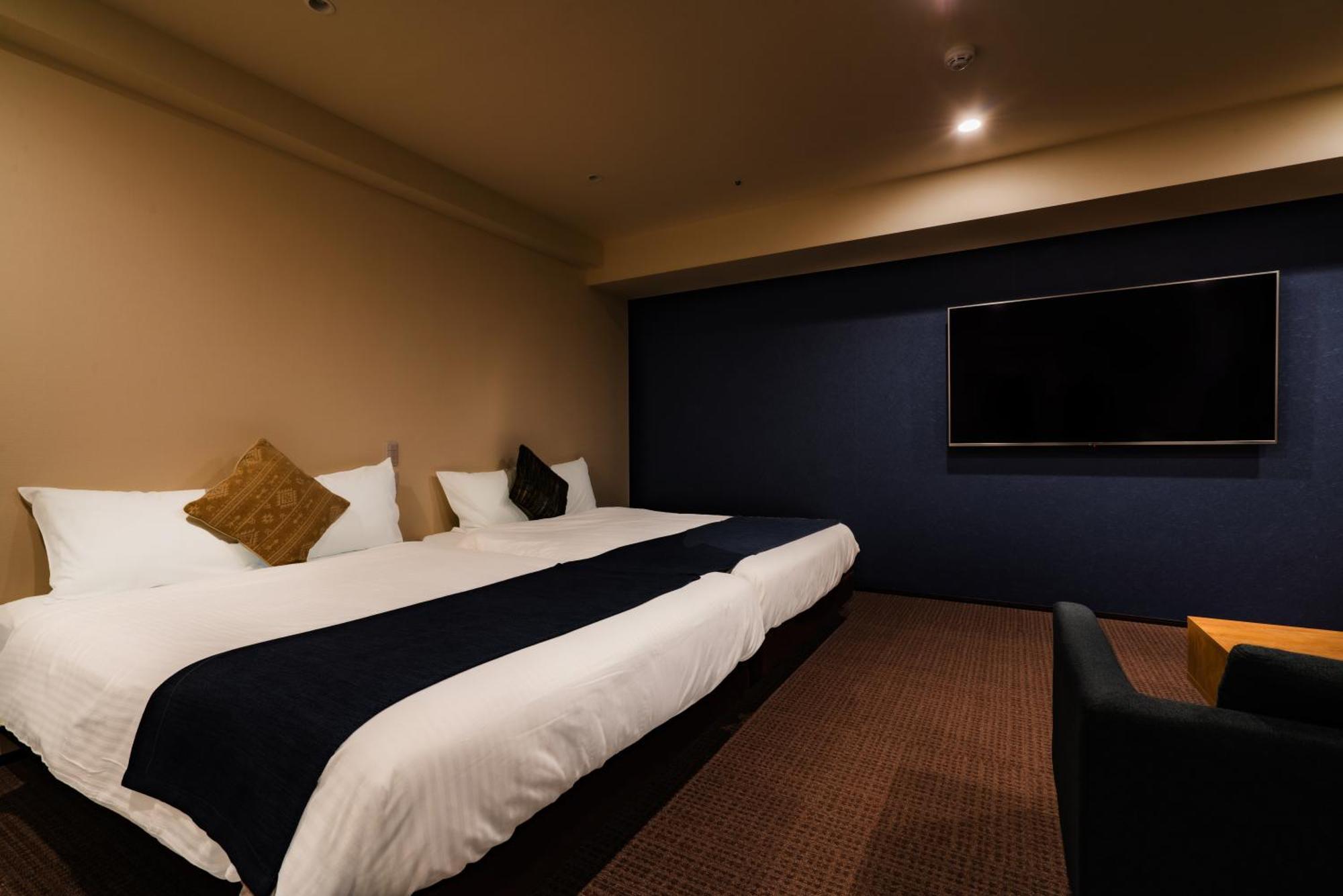 Randor Hotel Sapporo Suites Kamer foto A room at the hotel