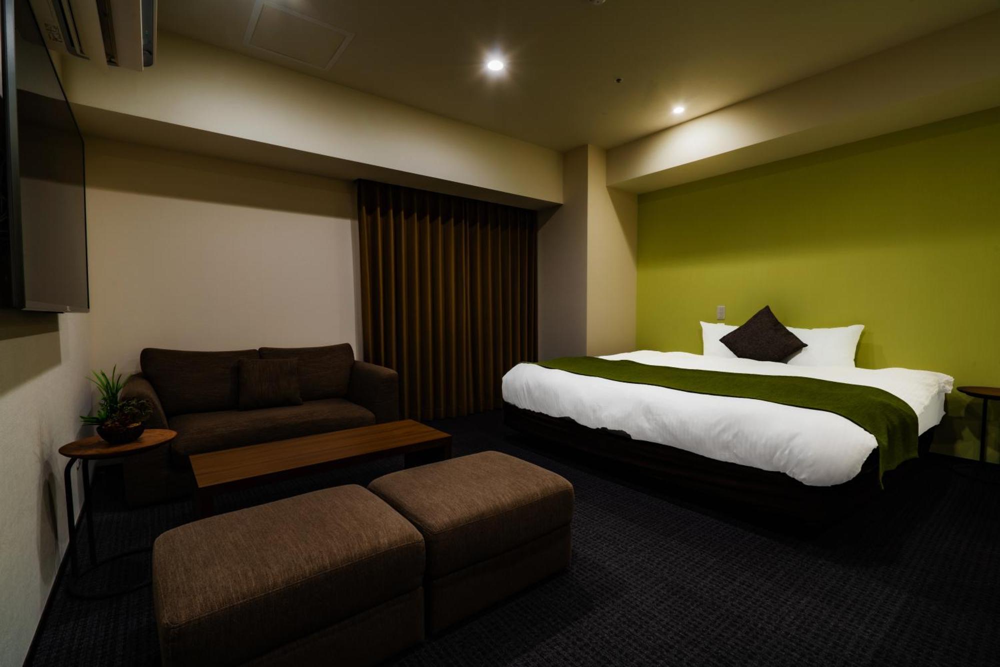 Randor Hotel Sapporo Suites Kamer foto A room at the hotel