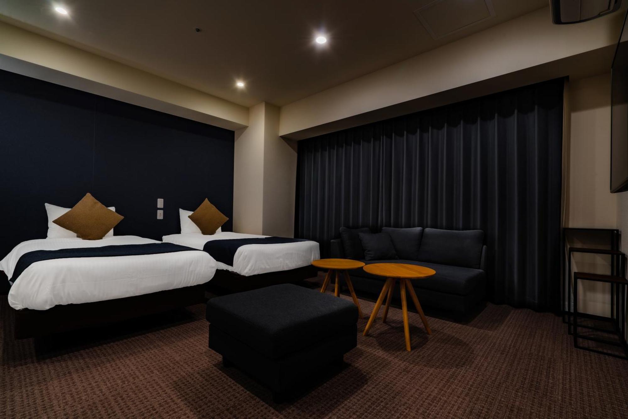 Randor Hotel Sapporo Suites Kamer foto A room at the hotel