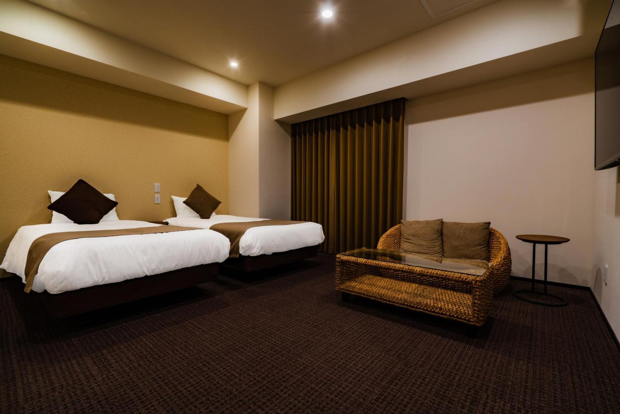 Randor Hotel Sapporo Suites Kamer foto A room at the hotel