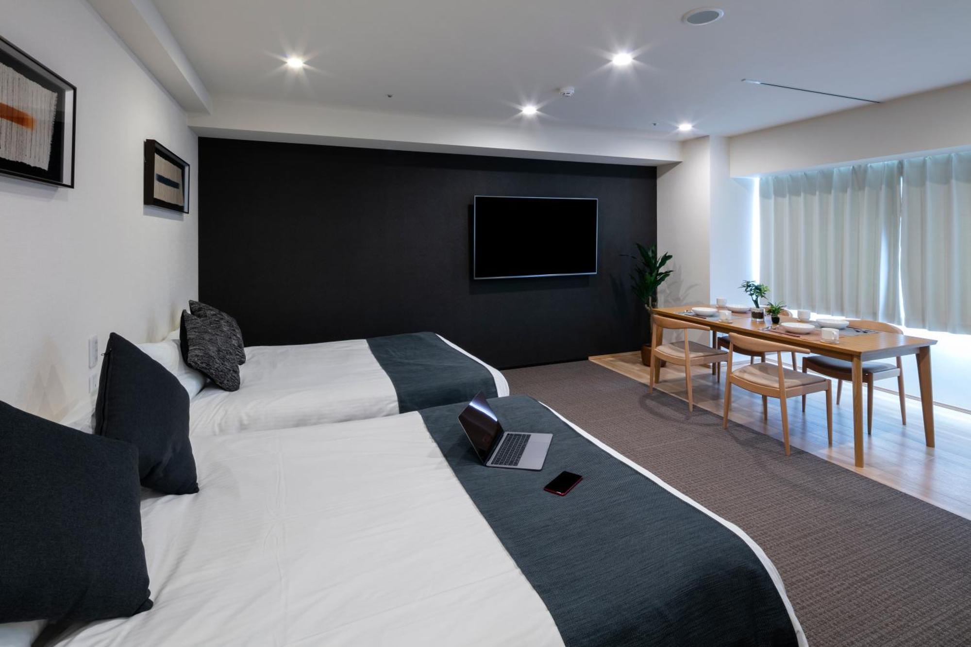 Randor Hotel Sapporo Suites Kamer foto A typical room at the hotel