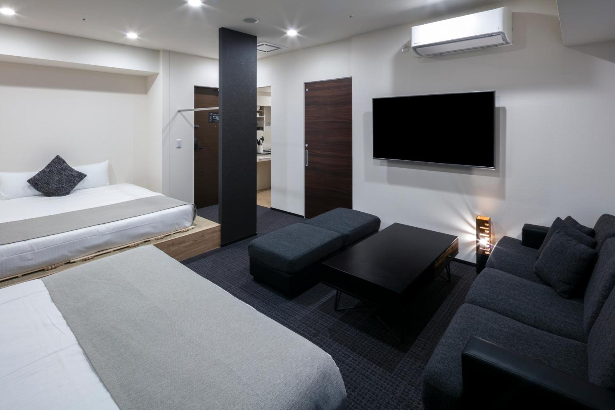 Randor Hotel Sapporo Suites Kamer foto A room at the hotel