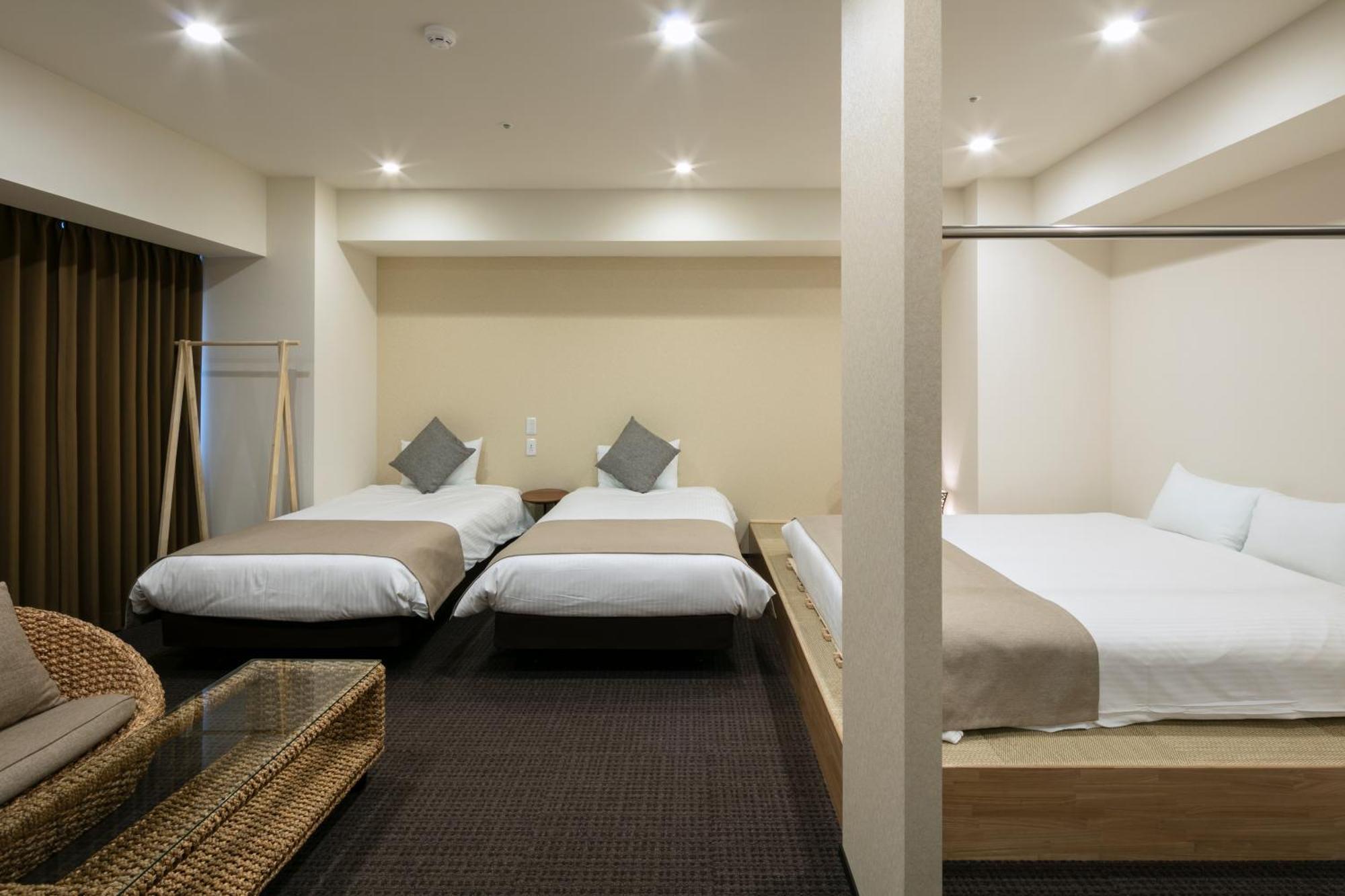 Randor Hotel Sapporo Suites Kamer foto A room at the hotel
