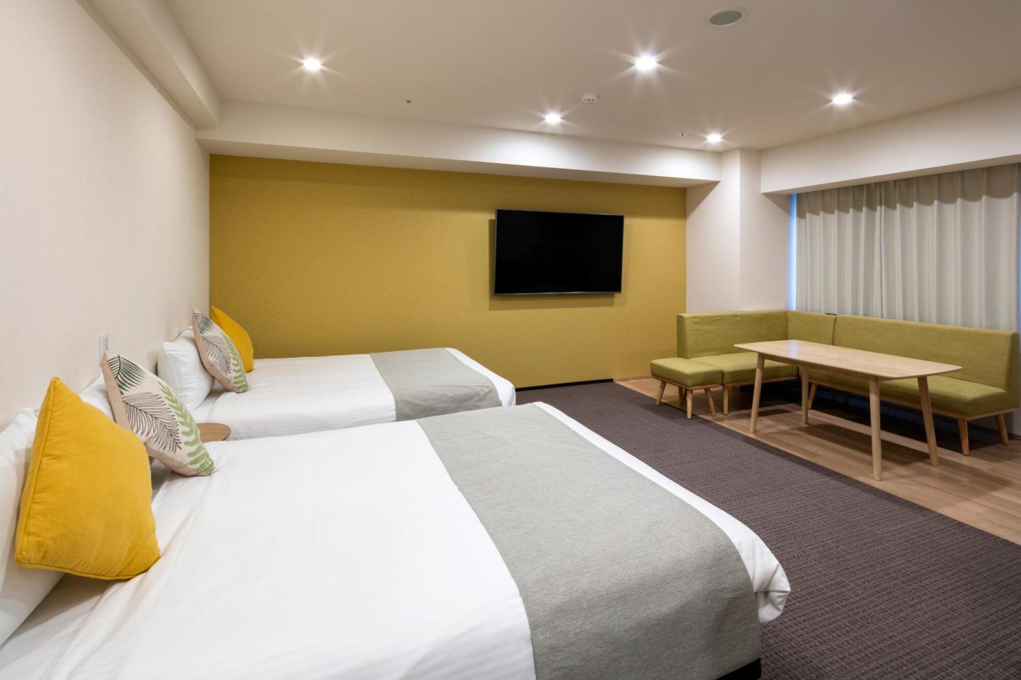 Randor Hotel Sapporo Suites Kamer foto A room at the hotel