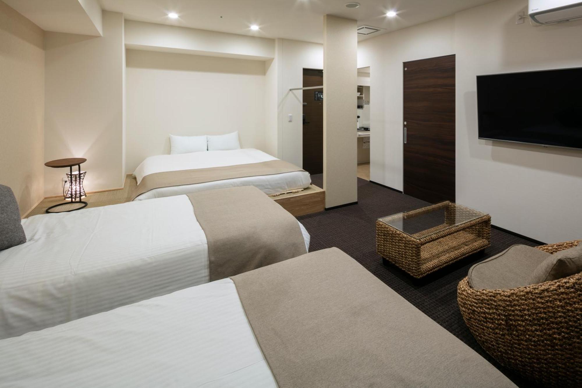 Randor Hotel Sapporo Suites Kamer foto A room at the hotel