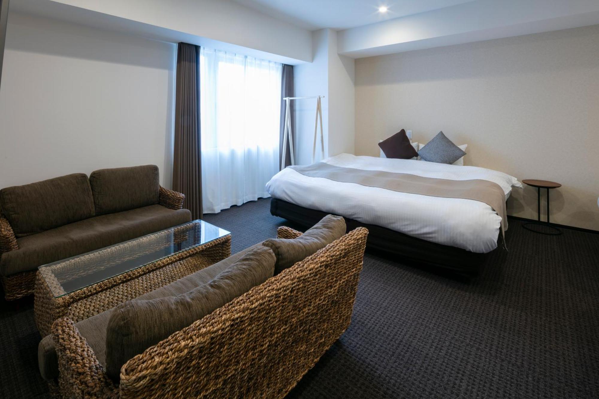 Randor Hotel Sapporo Suites Kamer foto A room at the hotel