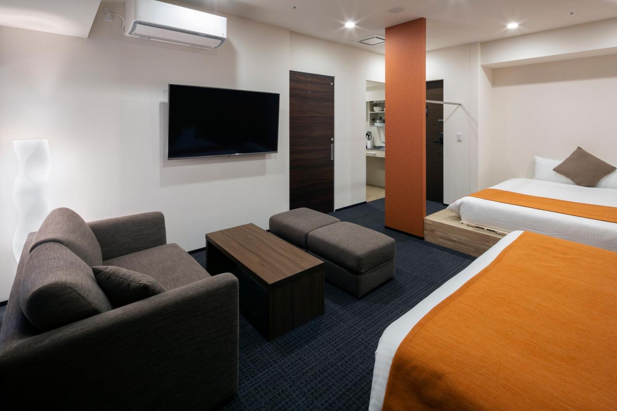 Randor Hotel Sapporo Suites Kamer foto A room at the hotel