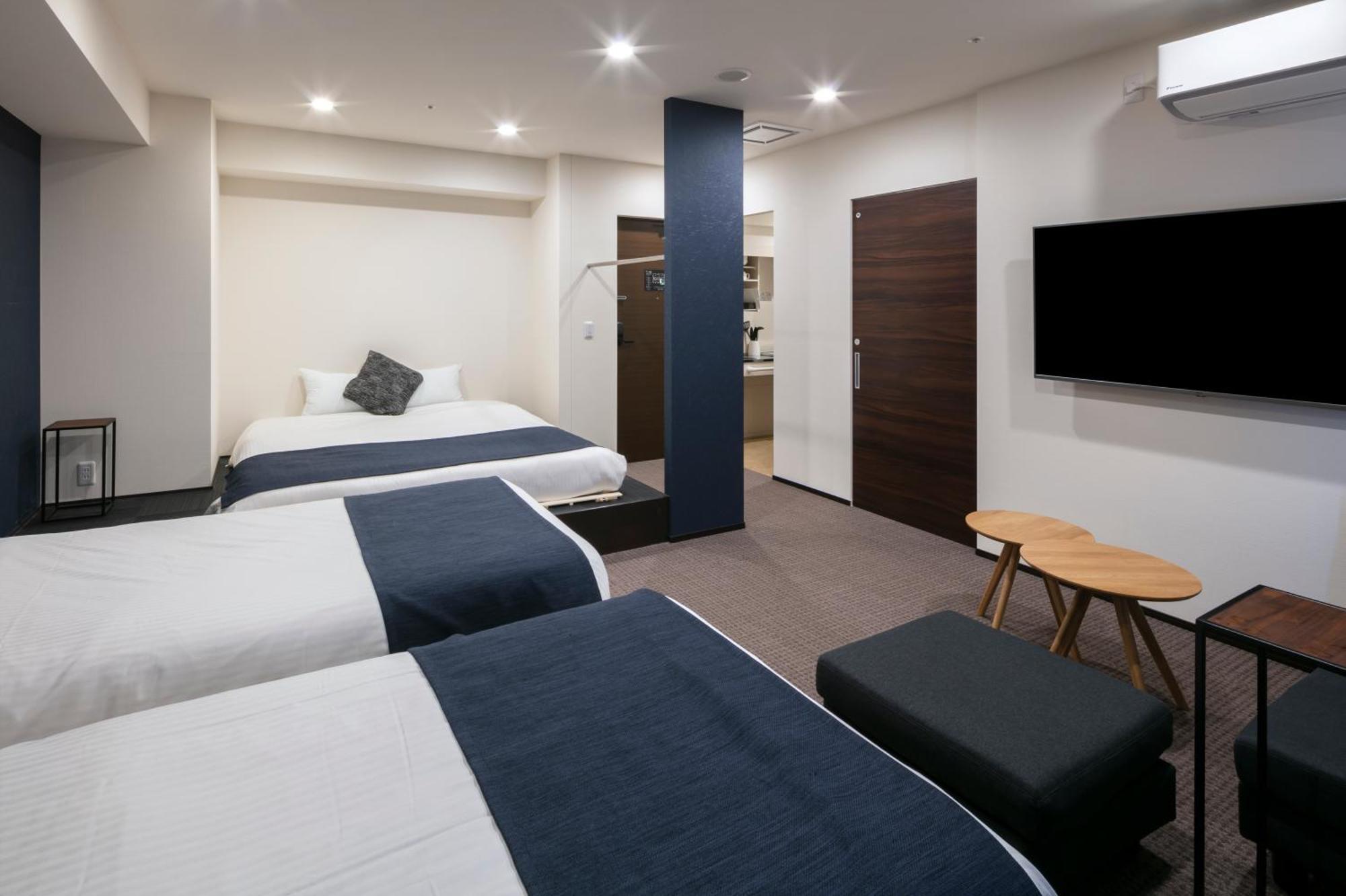 Randor Hotel Sapporo Suites Kamer foto A room at the hotel