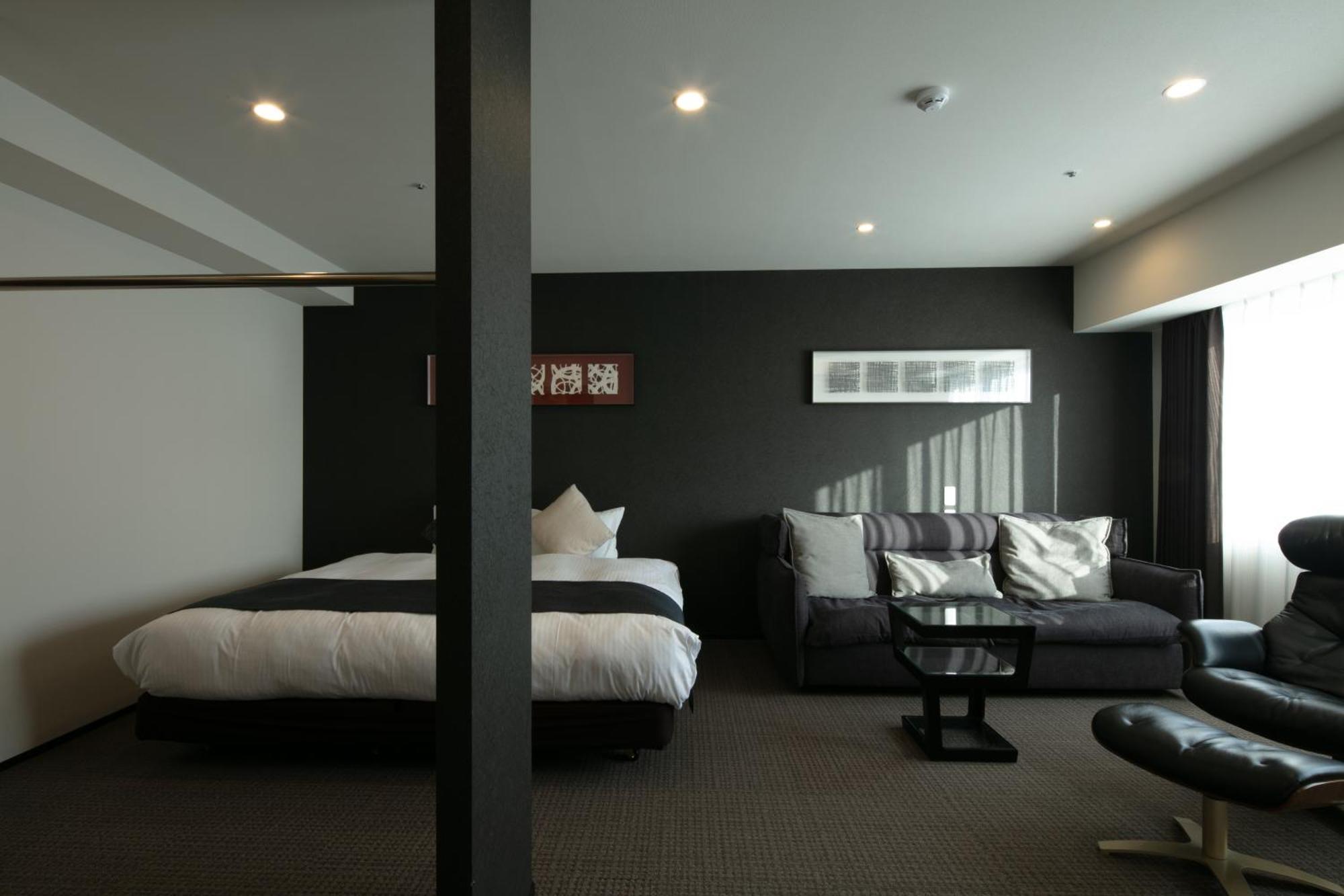 Randor Hotel Sapporo Suites Kamer foto A room at the hotel