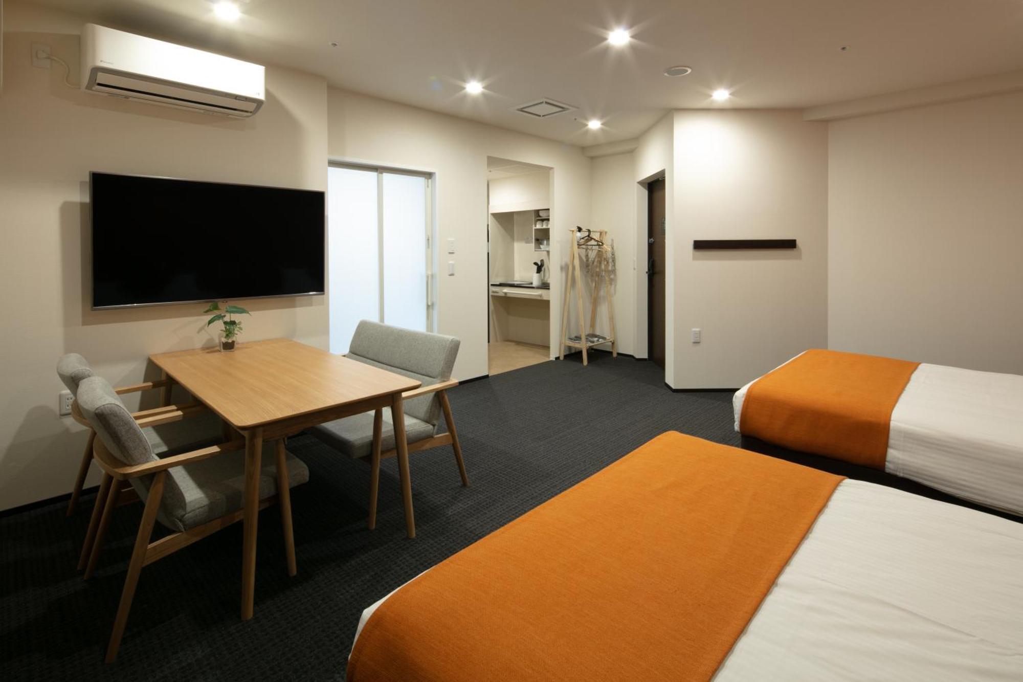 Randor Hotel Sapporo Suites Kamer foto A typical room at the hotel