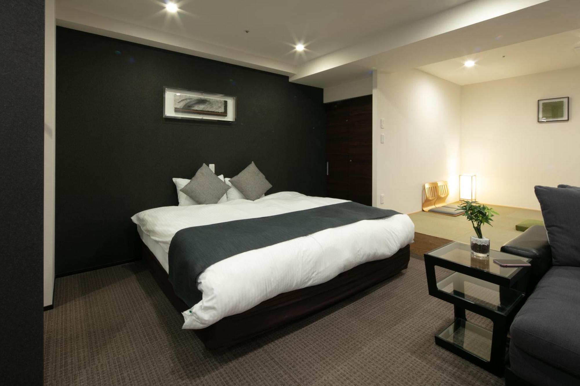 Randor Hotel Sapporo Suites Kamer foto A typical hotel room