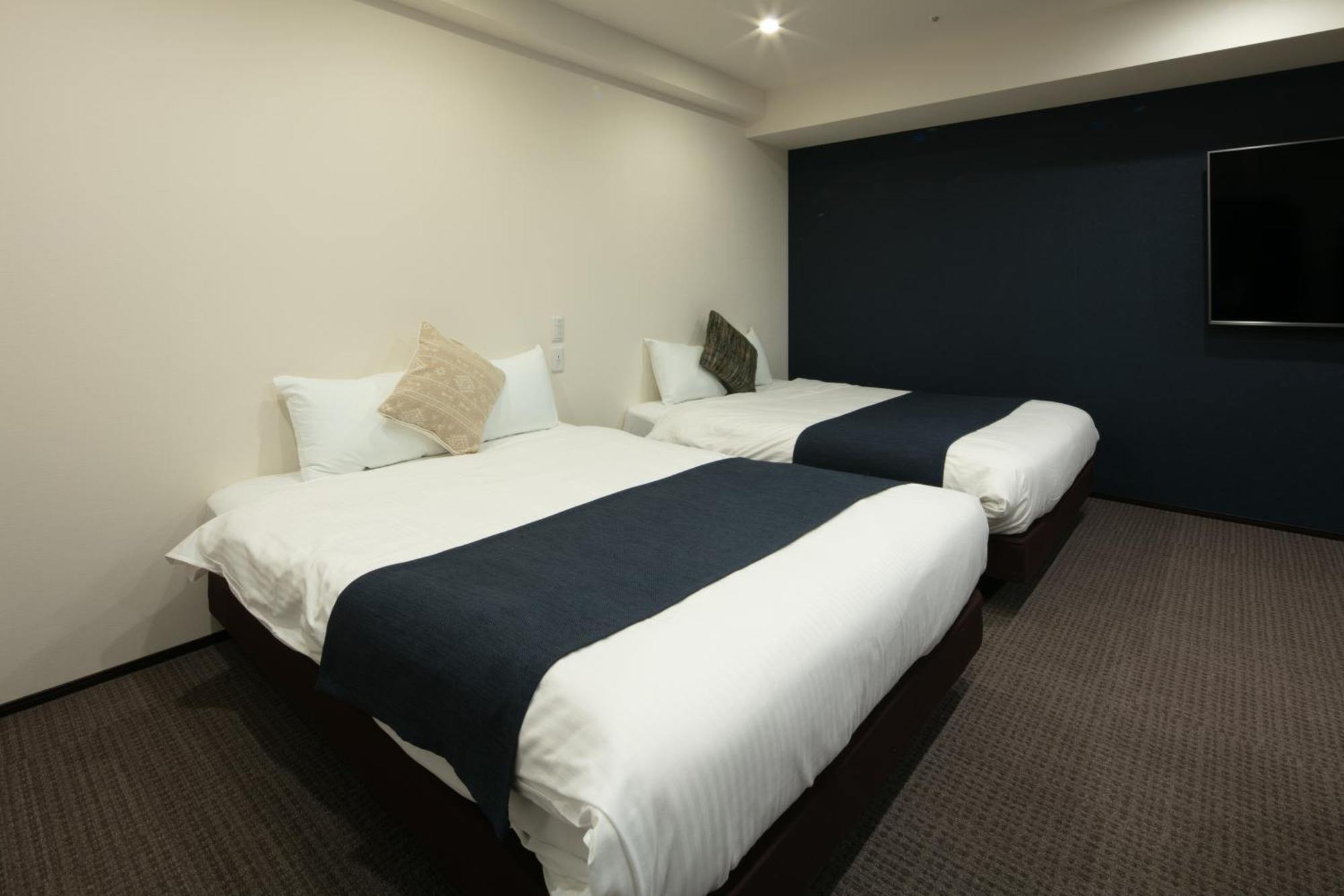 Randor Hotel Sapporo Suites Kamer foto A room at the hotel