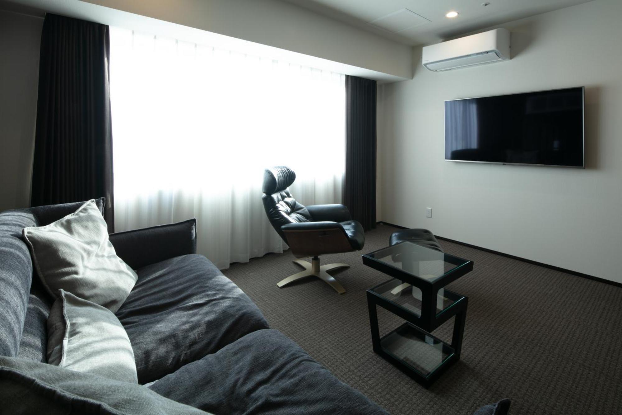 Randor Hotel Sapporo Suites Kamer foto A room at the hotel